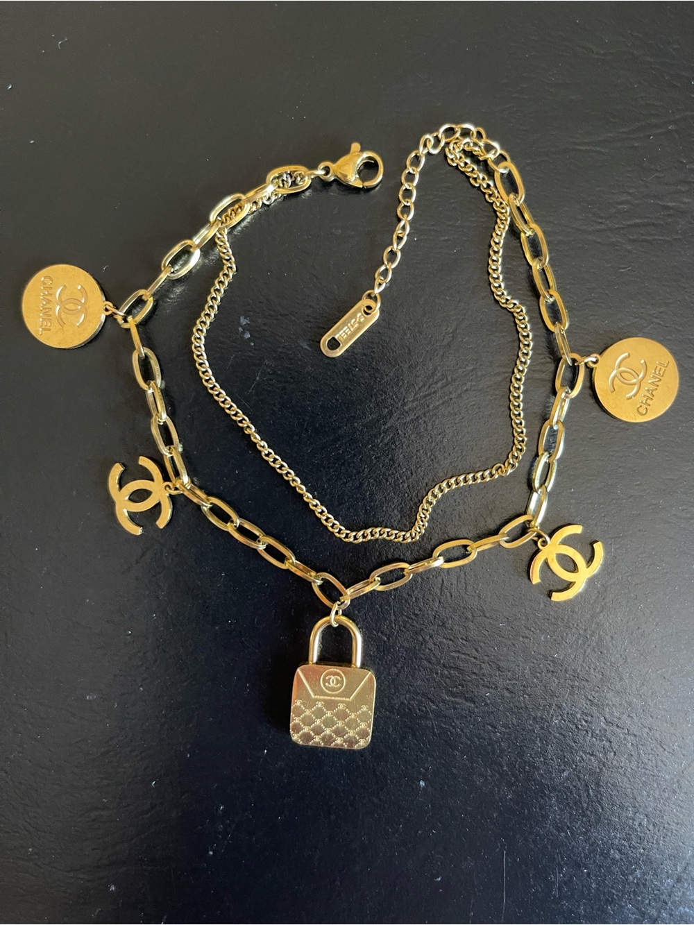 Classic gold plated cc charm bracelet.